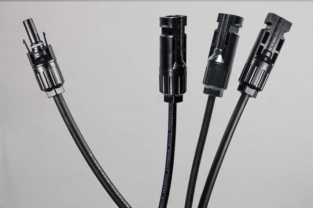 Close-up of PVconnectorpro CM31-B 1000V DC solar Y-branch connector showing pin and waterproof housing detail.