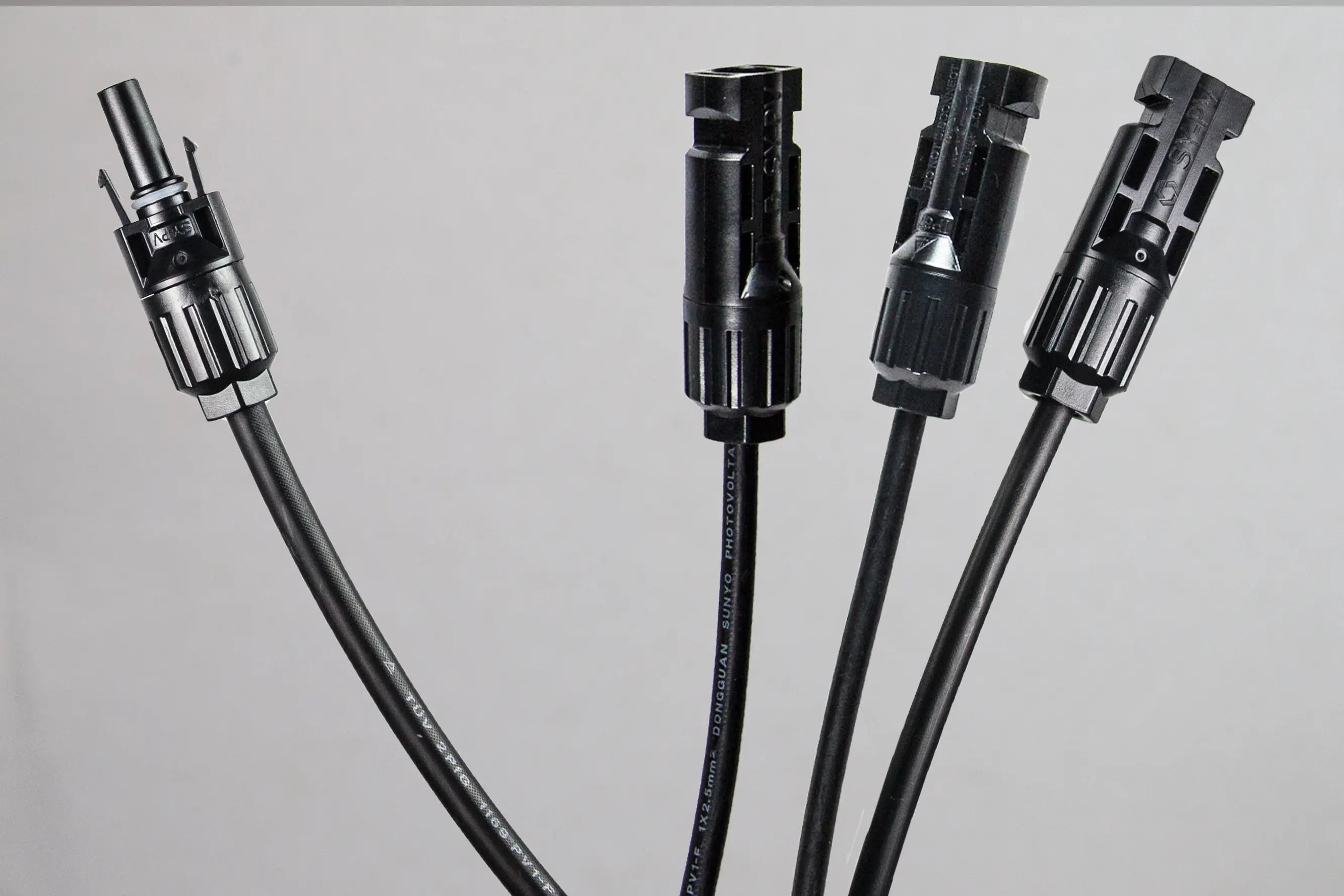 Close-up of PVconnectorpro CM31-B 1000V DC solar Y-branch connector showing pin and waterproof housing detail.