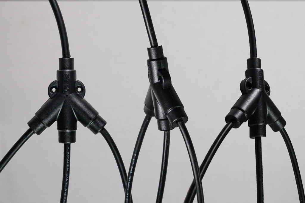 Close-up of PVconnectorpro CM31-B 1000V DC solar Y-branch connector, 3-in-1 T-type, waterproof IP67, rated 20A-40A.